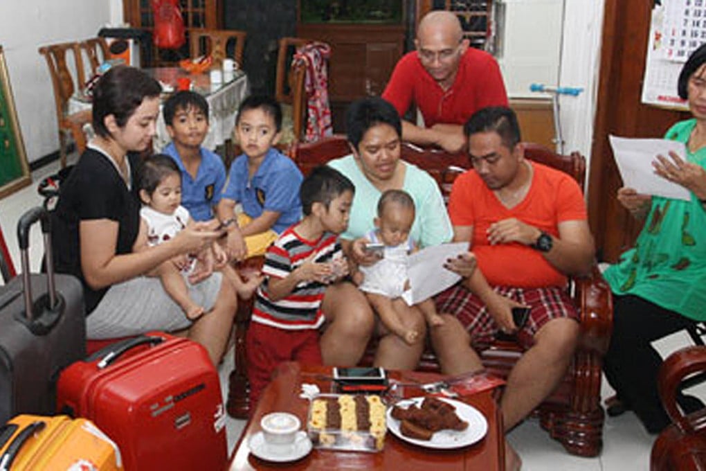 Former beauty queen Anggi Mahesti (left) and her family missed the flight after ignoring an email about its earlier departure. Photo: Java Post