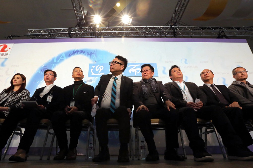 ATV executives, including Ip Ka-po (fourth from left), put on a united front in a meeting with staff. Ip said there had been potential investors, but they had fallen by the wayside. Photo: Felix Wong