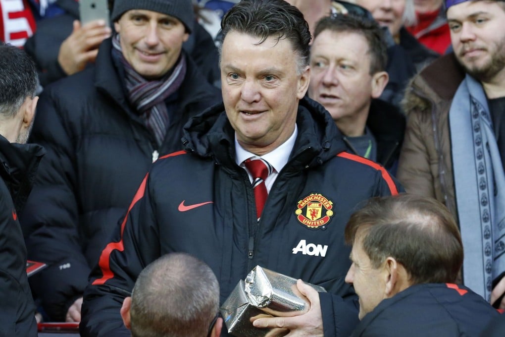 Louis van Gaal is loving life in England. Photo: AFP