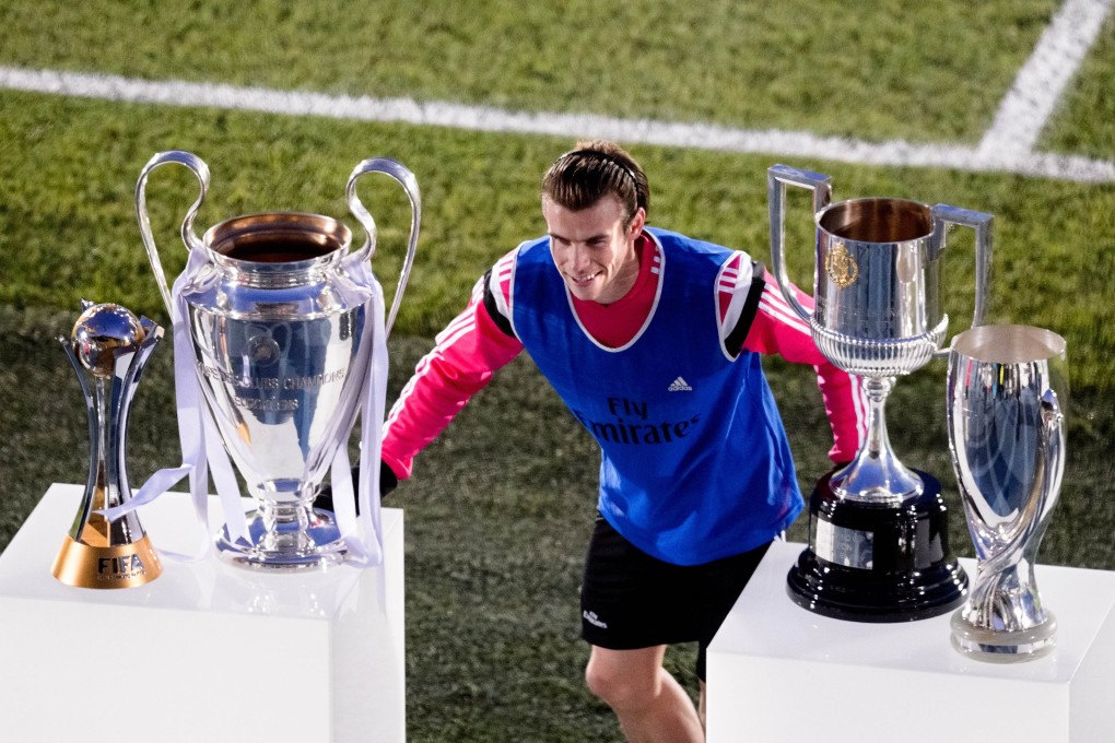 Gareth Bale with Real Madrid's trophies. Photo: AFP