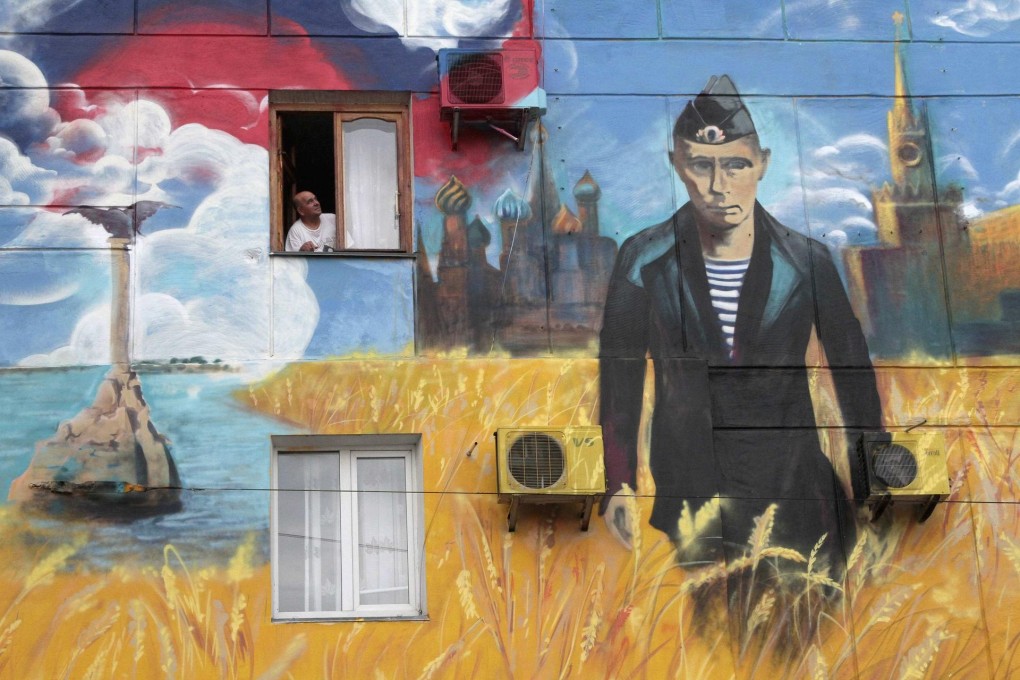 A mural in Sevastopol, Crimea of Putin, who still commands strong support at home. Photo: Reuters