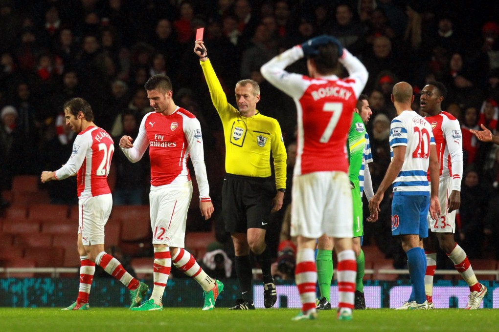 Arsenal's Olivier Giroud gets his marching orders for a headbutt on Nedum Onuoha of Queens Park Rangers during their English Premier League match on Boxing Day. Photo: EPA