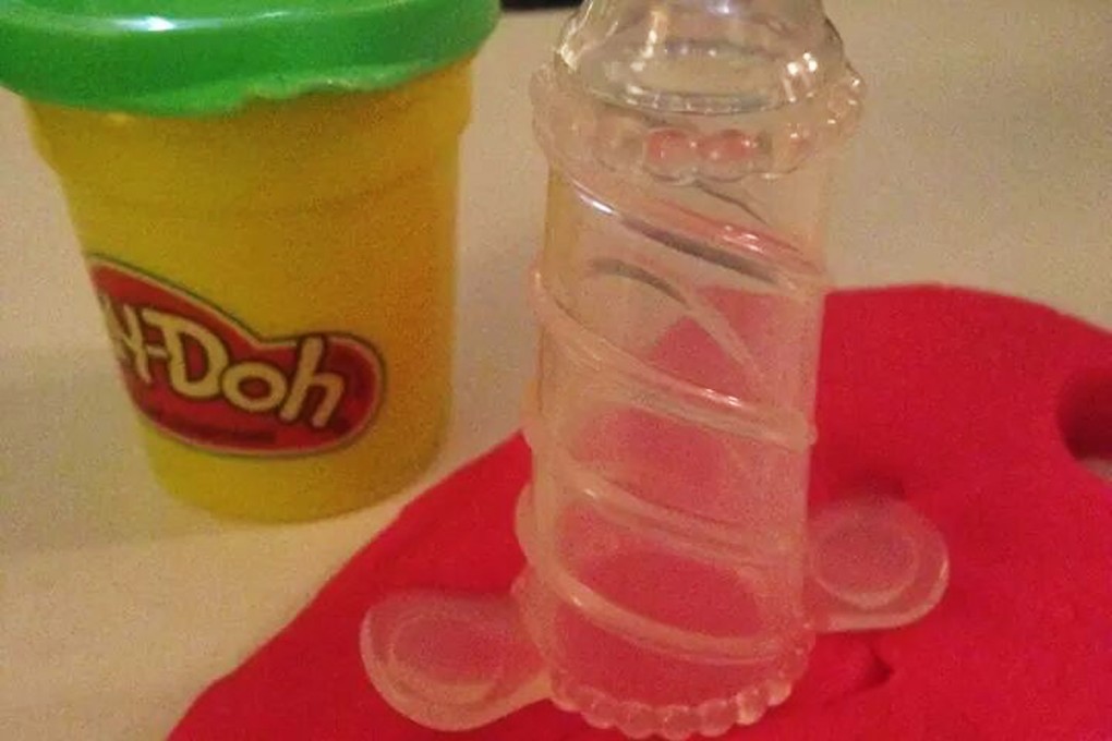 This photo shows the "extruder tool" from Hasbro’s Play-Doh Cake Mountain toy. Photo: AP