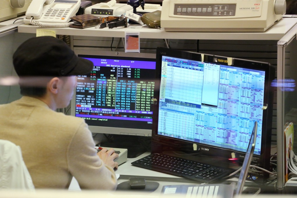 Hong Kong shares end year with a small gain