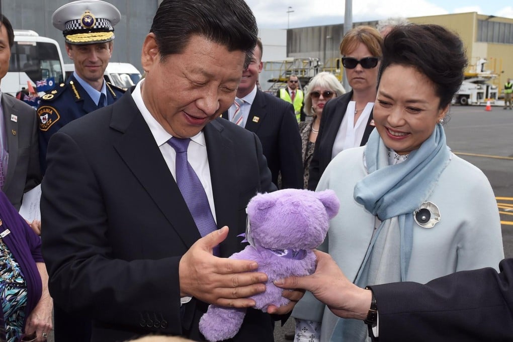 President Xi Jinping receives the purple bear in Tasmania. Photo: AFP