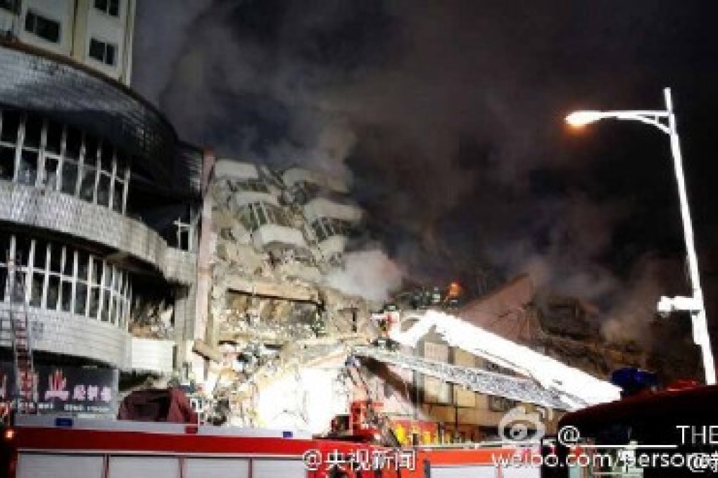 At least three firefighters died when a burning warehouse collapsed in Harbin in northern Heilongjiang province on Friday night. Photo: Weibo