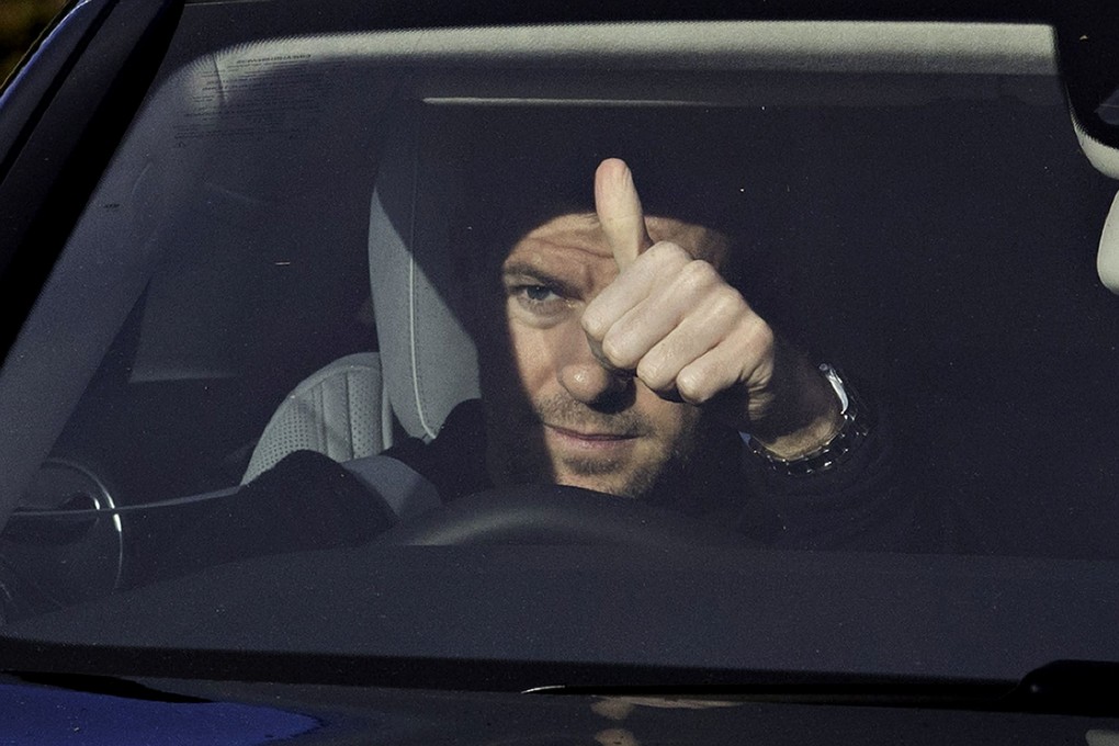 Steven Gerrard leaves the training ground at Liverpool yesterday after announcing he will quit the club at the end of this season. Photo: AFP