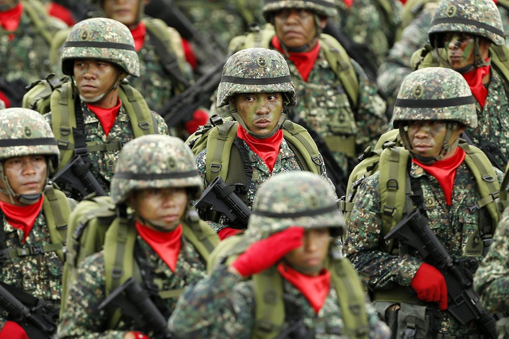 Filipino soldiers parade in Quezon city, eastern Manila last month. Photo: EPA