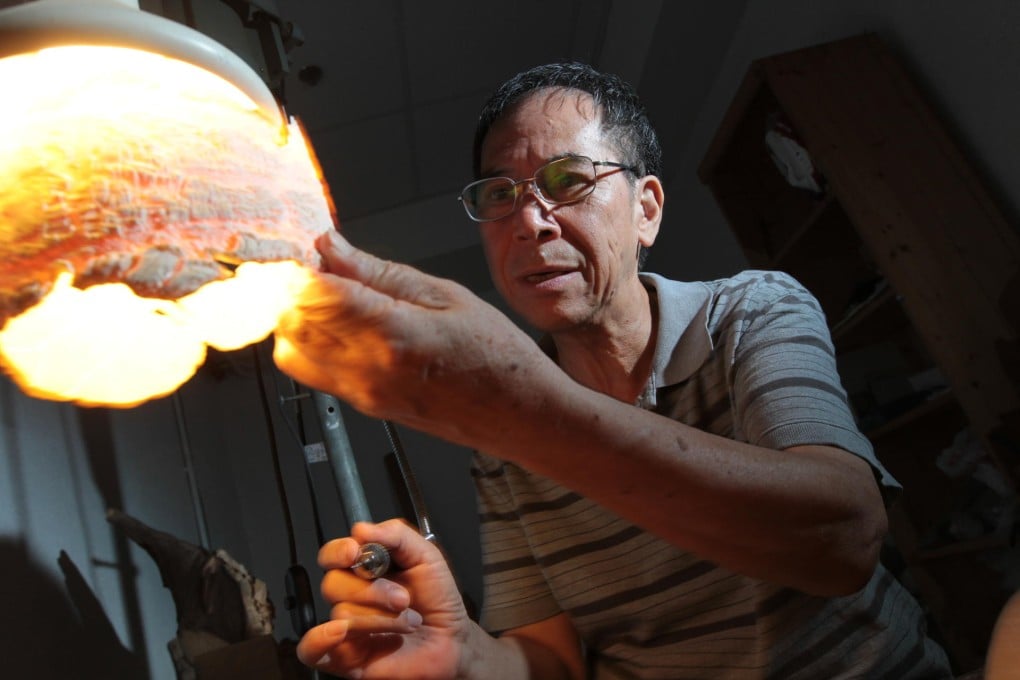 Leung Lee-cheong crafts with ivory at his studio. Photo: Bruce Yan