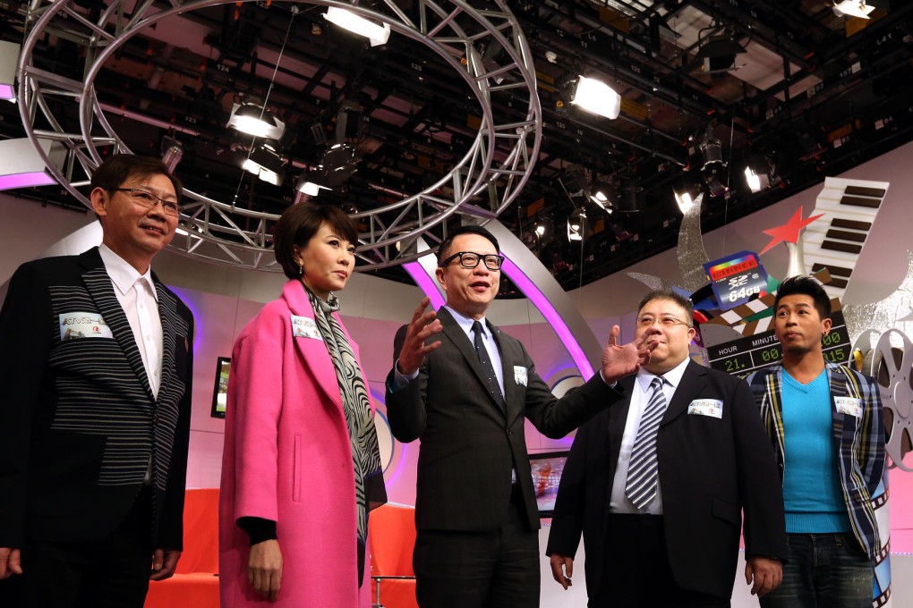 ATV executive director Ip Ka-po (centre) with artists Jaclyn Chu and Lawrence Lau in Tai Po yesterday. Photo: Nora Tam