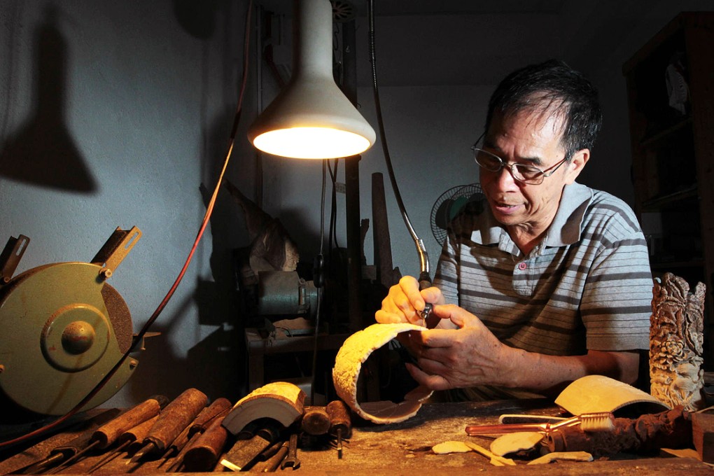 Ivory carver Leung Lee-cheong is one of 447 people and businesses licensed to possess ivory for commercial purposes. Photo: Bruce Yan