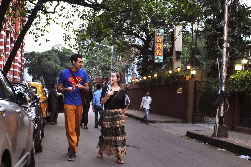 Foreigners walk on Sudder Street, a centrally located area popular among foreign backpackers, in Kolkata. Photo: AP