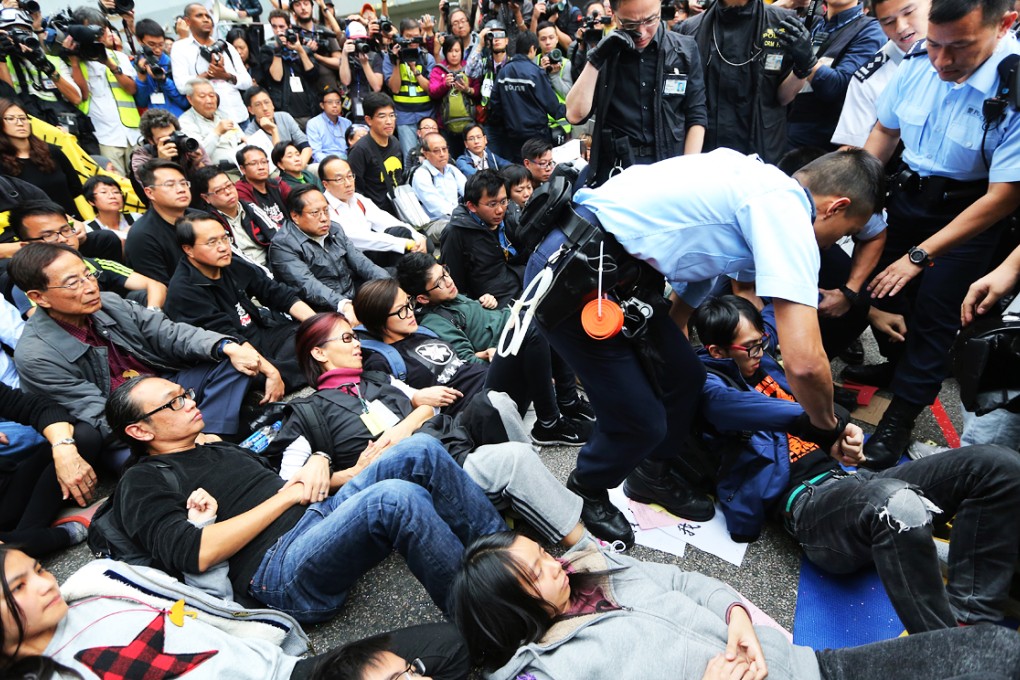 All 249 protesters arrested on December 11 (above), the last day of the Occupy Central camp in Admiralty, were released unconditionally the morning after. Most of them had refused bail. Photo: Sam Tsang