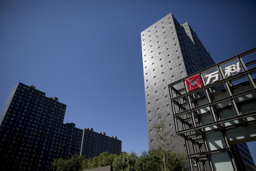 Beijing residential development rises as industry analysts feel restrictions on property sector in top Chinese cities will not be immediately lifted in 2015. Photo: Bloomberg