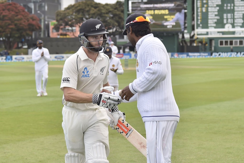 New Zealand's Kane Williamson shakes hands with Sri Lanka's Kumar Sangakkara as he walks off after making an unbeaten 242 on day four of the second test at the Basin Reserve in Wellington. Photos: AFP