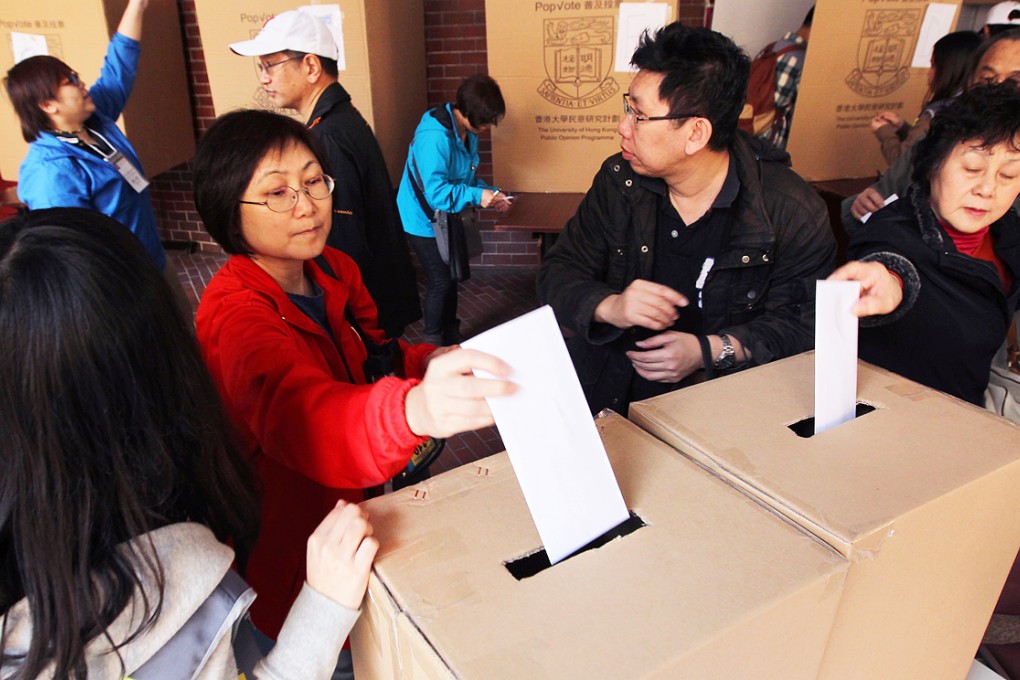 People vote at a polling station in Hong Kong Polytechnic University in Hung Hom in the mock Chief Executive election. Photo: Dickson Lee
