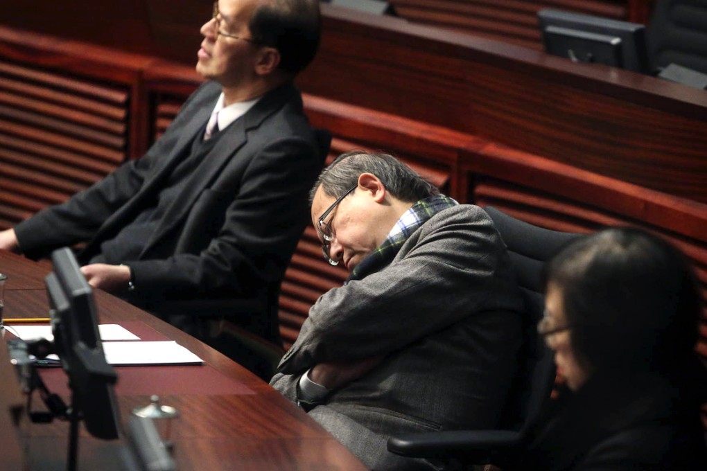 Secretary for Security Lai Tung-kwok makes no effort to mask his sleepiness during the speech. Photo: Sam Tsang