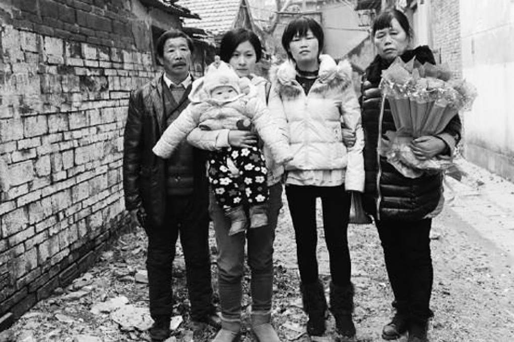 An ageing couple in Anhui were reunited with their daughter, second from right, this week after she was kidnapped 30 years ago, aged four. PHOTO: SCMP Pictures