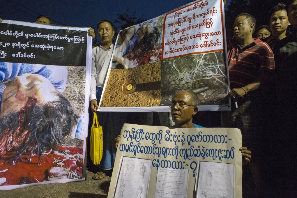 People hold up banners against a Chinese-run copper mine in Myanmar, where a variety of obstacles may make it tough for the mining industry to flourish. Photo: Reuters