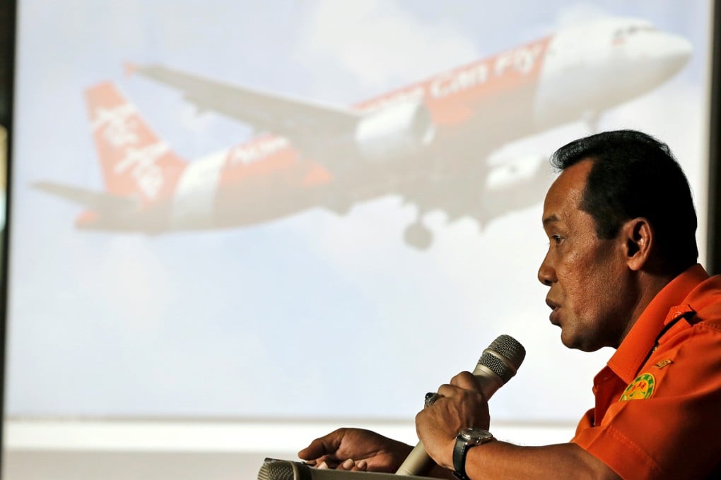 Indonesia's National Search And Rescue Agency chief Henry Bambang Soelistyo gives a briefing on the downed aircraft. He says the wrecked tail section will be lifted once the black boxes are found. Photo: AP