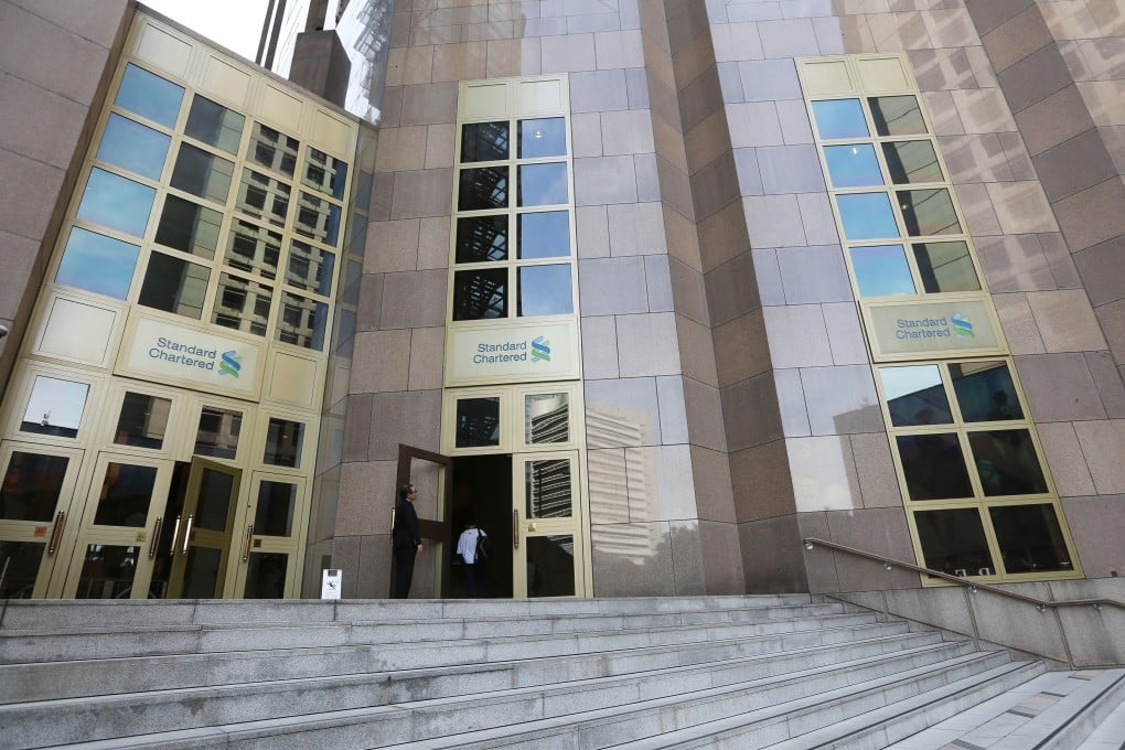 Stanchart Building StanChart says to close cash equities trading; cut 2,000 more retail ...