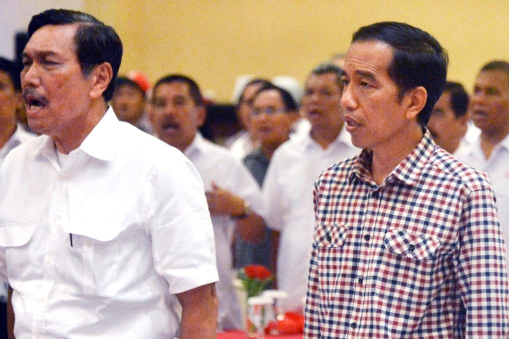Joko Widodo (right) and Luhut Binsar Panjaitan. Photo: AFP