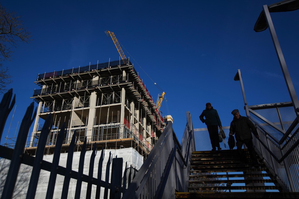 While British manufacturing and services firms are confident about their prospects this year, builders see uncertainty. Photo: Bloomberg