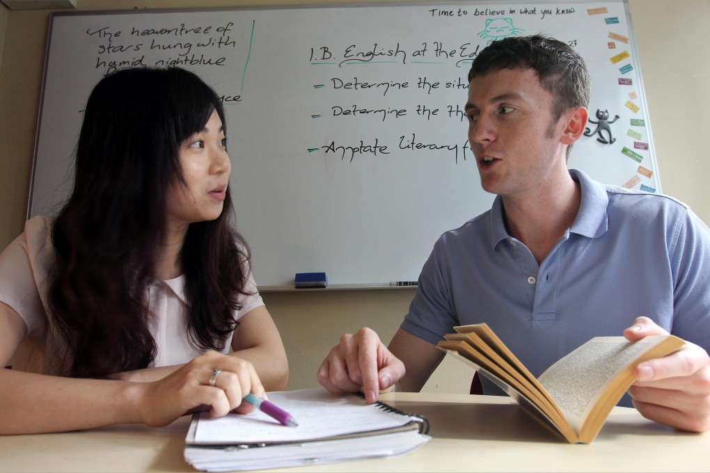 Student Tracy Tian (left) and English instructor Conor Dawson at the American accent tutorial school in Causeway Bay. Photo: Dickson Lee