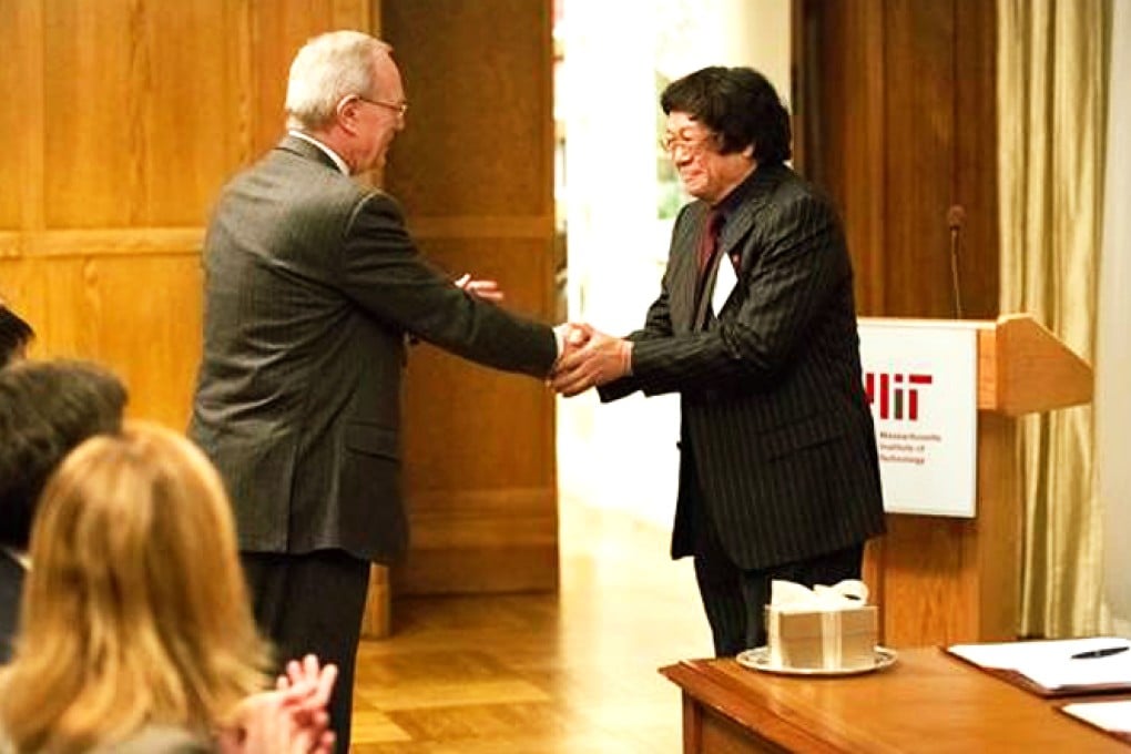 MIT President L. Rafael Reif shakes hands with Samuel Tak Lee at the signing ceremony formalising Lee's gift to the university. Photo: Bryce Vickmark/MIT
