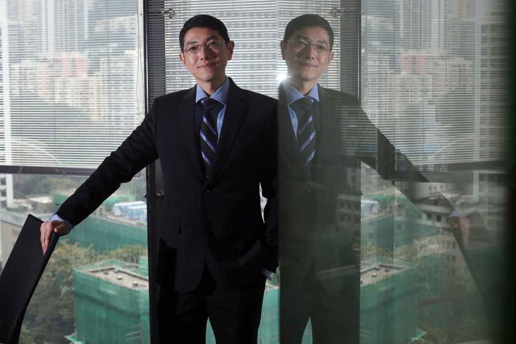 Hong Kong liquidator Mat Ng, managing director of JLA Asia, poses for a picture in his office in the city's business district. Photo: Sam Tsang