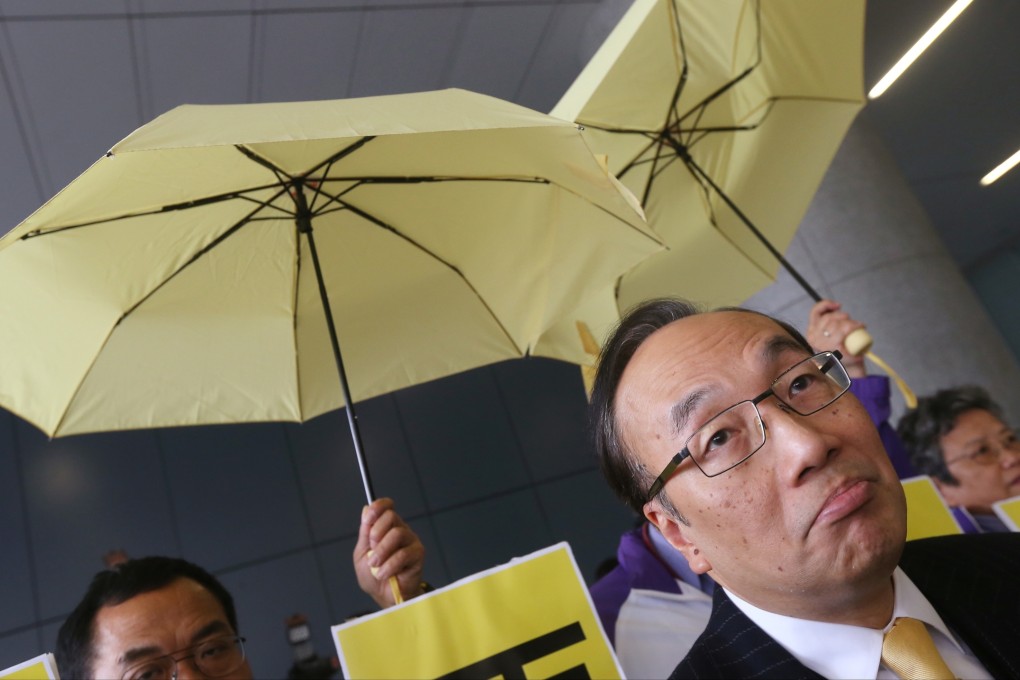 Lawmaker Alan Leong Kah-kit (front) and members of Civic Party protest outside Legco Building before Legco meeting. Photo: David Wong