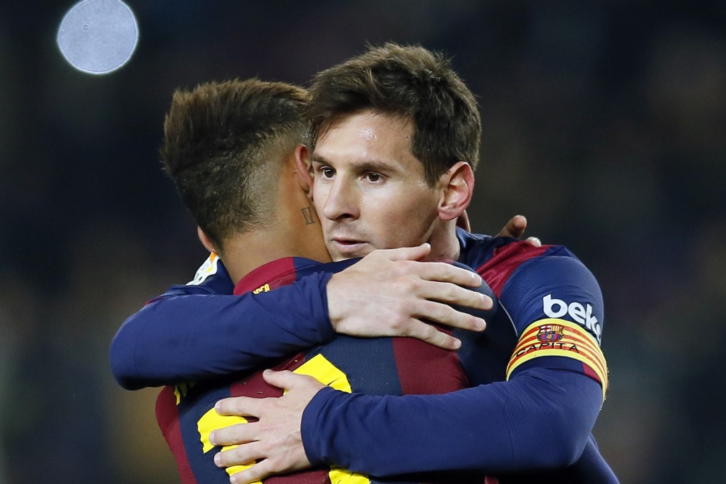 Lionel Messi hugs Neymar. Photo: Reuters