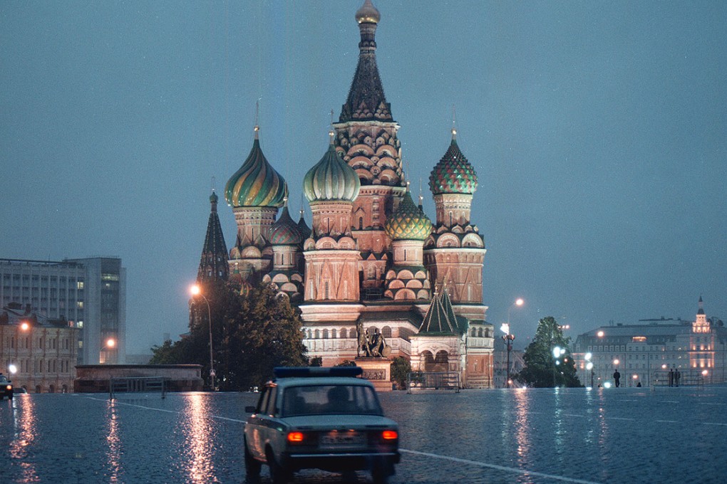 A car passes through Moscow's Red Square past St Basil's cathedral. Photo: AP