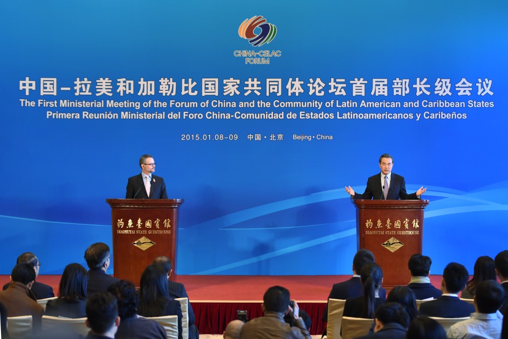 Chinese Foreign Minister Wang Yi (right) and his Costa Rican counterpart Manuel Gonzalez Sanz hold a press conference in Beijing. Photo: Xinhua