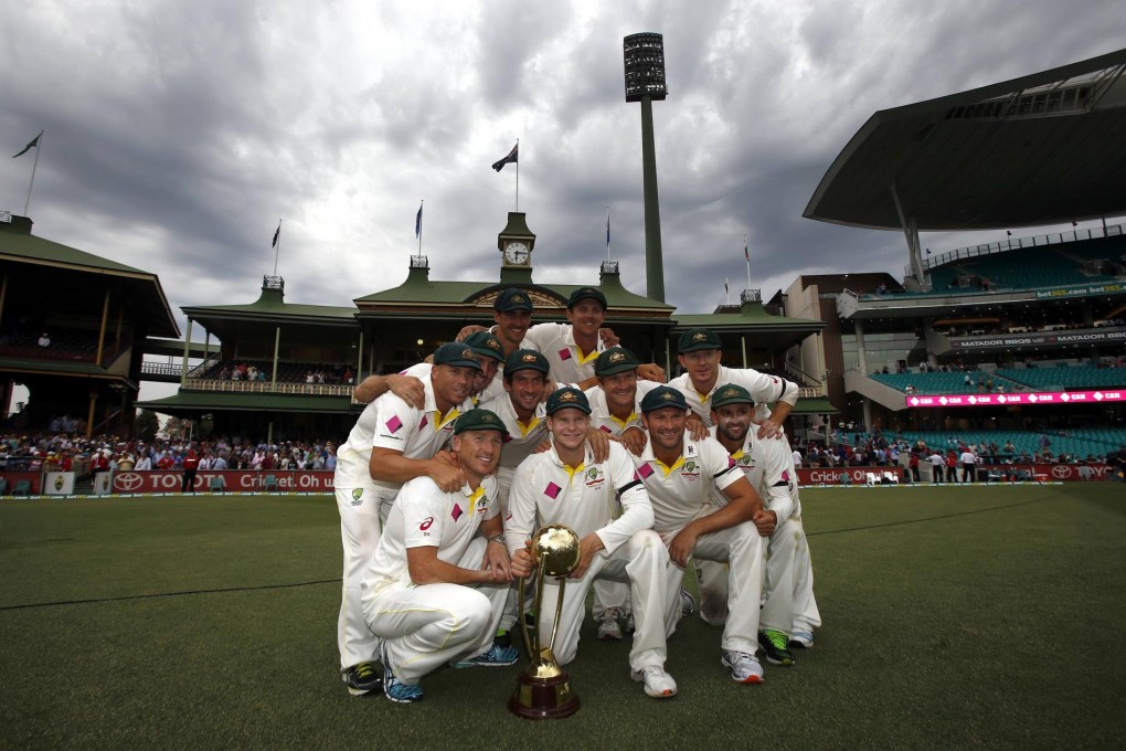 Australian captain Steven Smith holds the Border-Gavaskar trophy in Sydney. Photo: Reuters