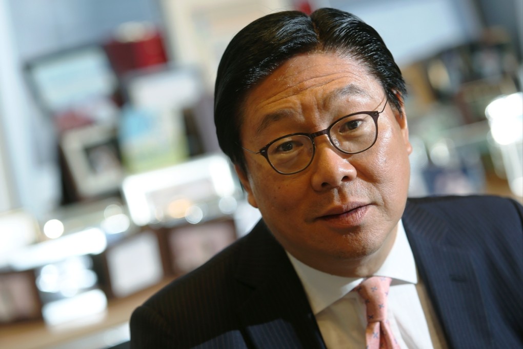 Frederick Ma says Li Ka-shing's reorganisation of his business empire has nothing to do with Occupy Central. Photo: Sam Tsang