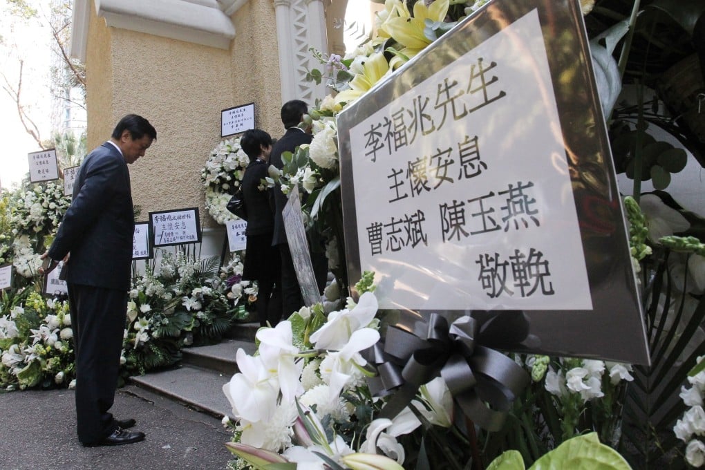 Flowers festoon the funeral service of Ronald Li at St. John's Cathedral in Hong Kong's central business district. Photo: May Tse