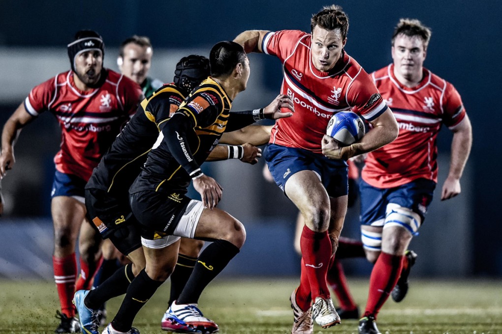 Hong Kong Scottish centre Bryan Rennie sizes up the opposition in the HKRFU Premiership on Saturday. Photos: HKRFU