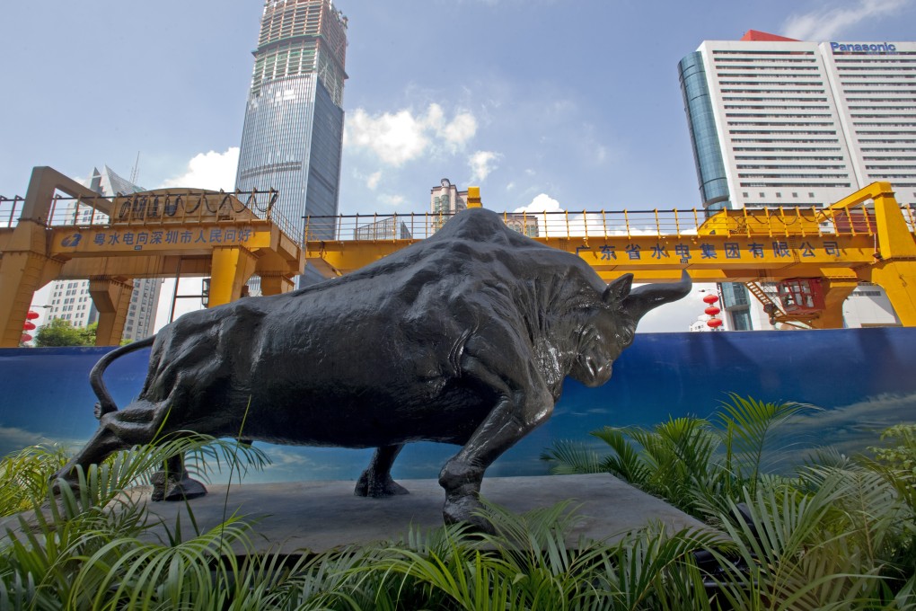 A charging bull sits outside the Shenzhen Stock Exchange as China is again asking the city to lead the charge on economic reform in the years ahead. Photo: Bloomberg