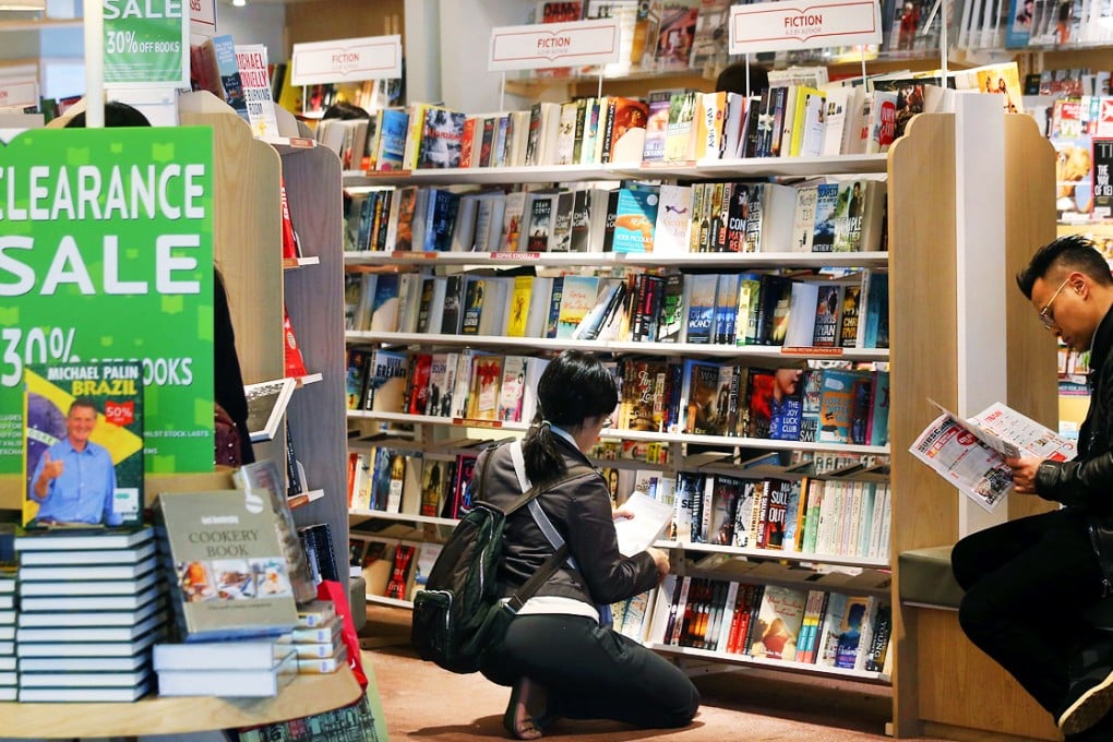 Customers browse at Dymocks in IFC Mall. Photo: David Wong