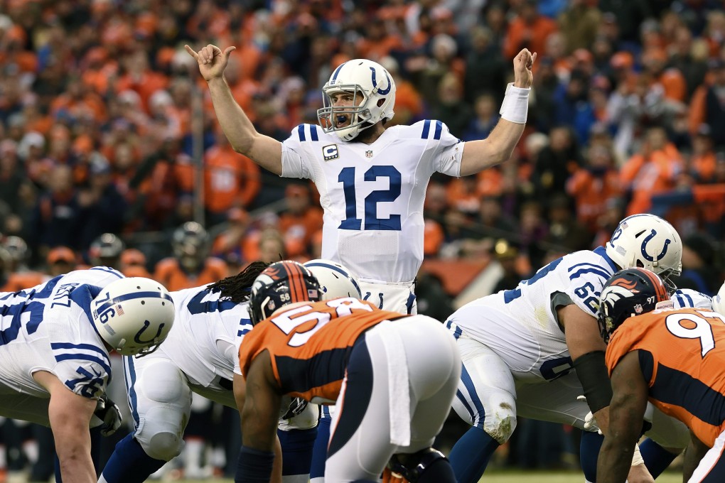 Indianapolis Colts quarterback Andrew Luck signals a change in plays to his teammates  against the Denver Broncos. Photo: EPA