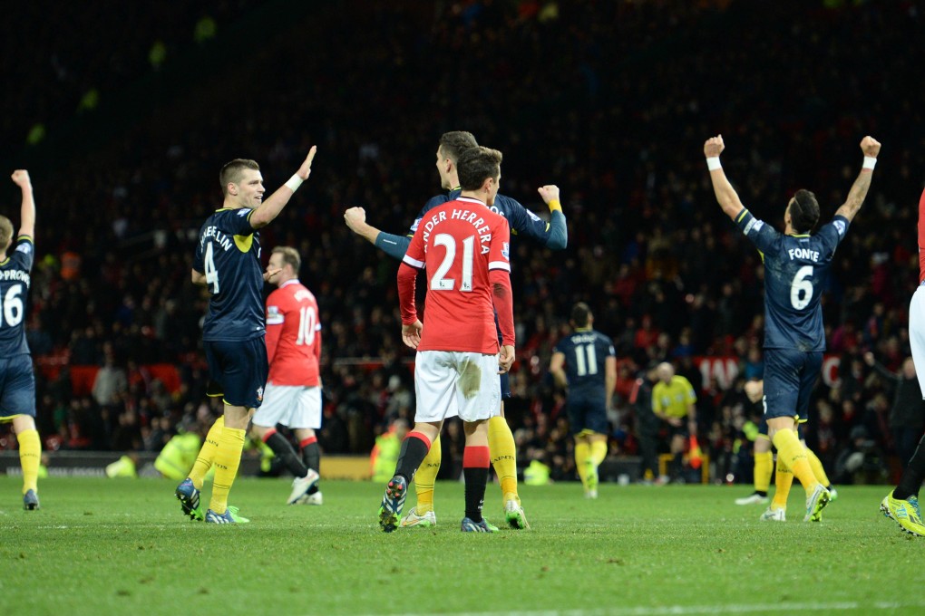 Southampton players celebrate their first victory at Old Trafford in 27 years. Photo: AFP