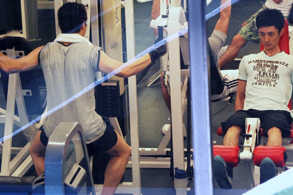 Members of a fitness club in Hong Kong working out. Photoa; May Tse