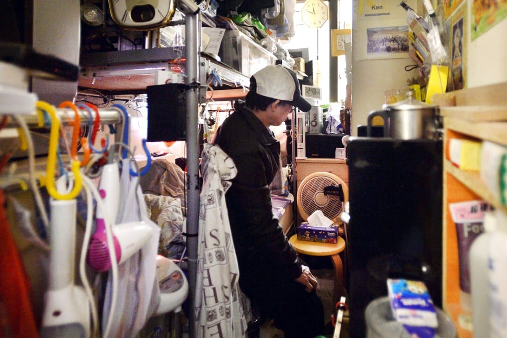 As officials struggle with a decade-long plan to build affordable homes, Ken Leung lives in one of at least 10,513 subdivided flats in Sham Shui Po. Photo: SCMP
