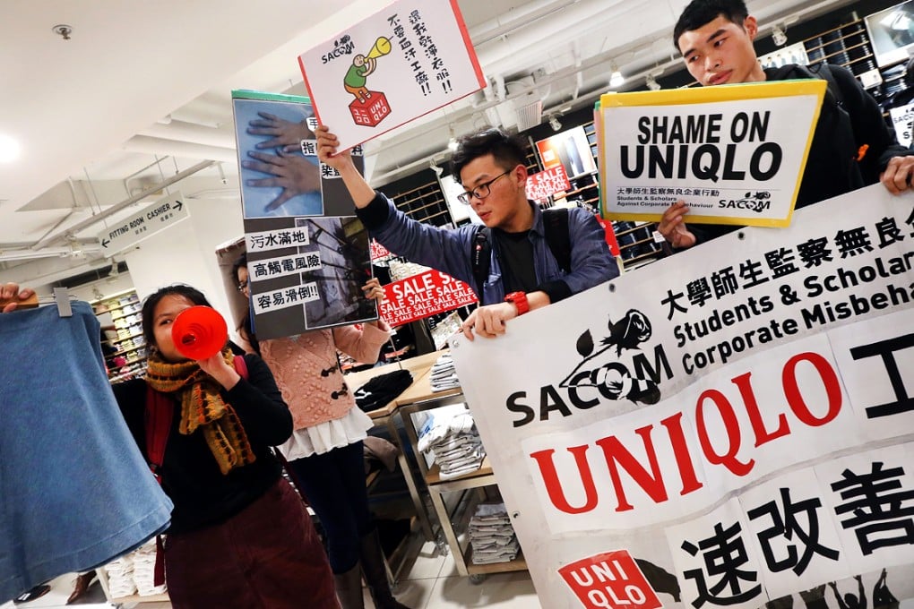 A protest in Uniqlo's store in Festival Walk, Kowloon Tong, after claims were made about the brand's suppliers. Photo: David Wong