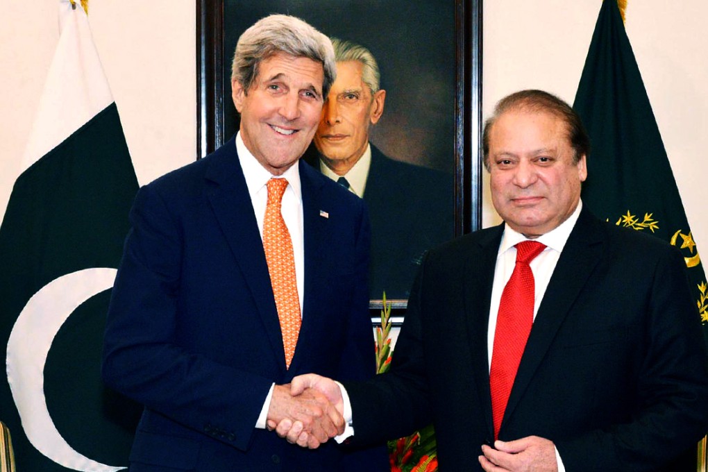 US Secretary of State John Kerry (left) shakes hands with Pakistan Prime Minister Nawaz Sharif shortly after arriving in the capital Islamabad on Monday. Photo: AFP