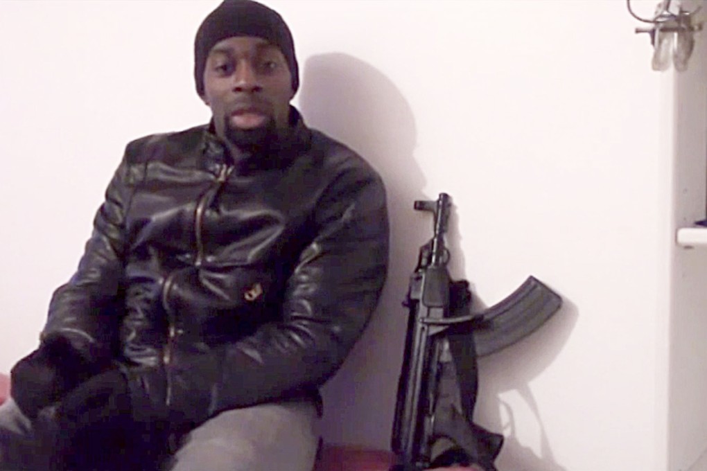 Amedy Coulibaly one of gunmen behind the worst militant attacks in France for decades, declares his allegiance to Islamic State in this still image taken from video. Photo: Reuters