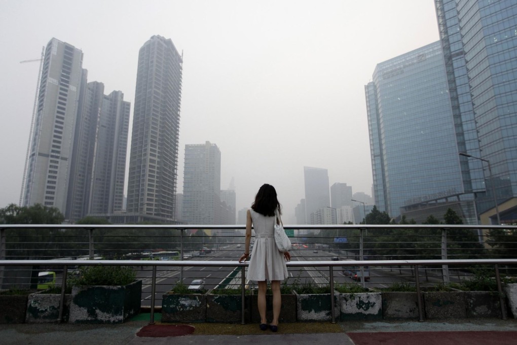 Kaisa Plaza in Beijing seen under construction in 2012, before the developer began its descent into crisis late last year. Photo: Reuters