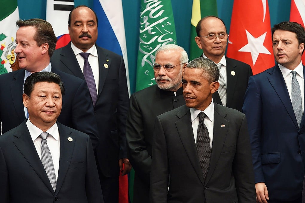 Britain's Prime Minister David Cameron and China's President Xi Jinping join other world leaders at the G20 Summit in Brisbane in November 2014. Photo: AFP