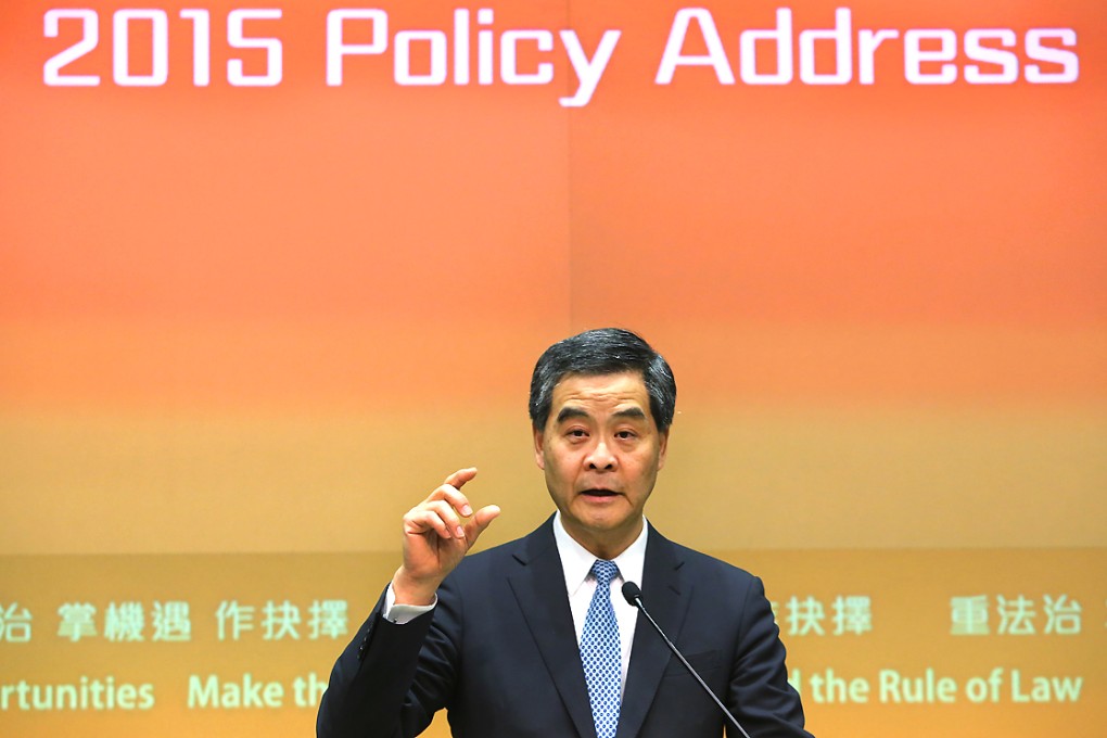 The chief executive meets the media on his policy address. Leung pledged to boost long-term land supply to ease the housing crunch. Photo: Sam Tsang